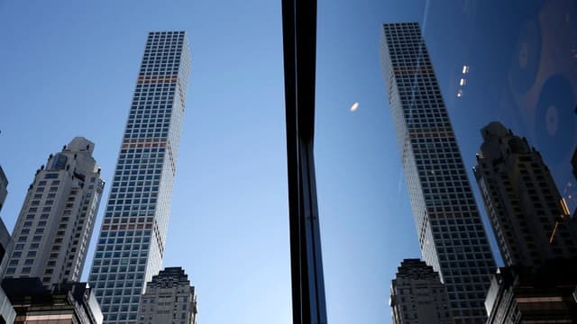 ニューヨークの<ruby ><rb><span class="jlpt-n5" word="高い">高</rb><rt>たか</rt></ruby>い</span><span class="jlpt-n2" word="マンション">マンション</span>に<span class="jlpt-n5" word="たくさん">たくさん</span>のひび、<ruby ><rb><span class="unknown" word="住人">住人</span></rb><rt>じゅうにん</rt></ruby>が<ruby ><rb><span class="jlpt-n5" word="会社">会社</span></rb><rt>かいしゃ</rt></ruby>をうったえる