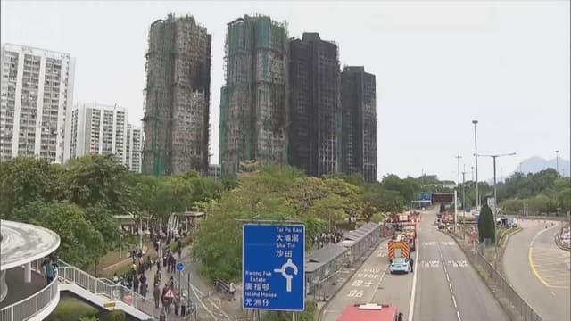 <ruby ><rb>香港</rb><rt>ほんこん</rt></ruby>のマンションで<ruby ><rb>大</rb><rt>おお</rt></ruby>きな<ruby ><rb>火事</rb><rt>かじ</rt></ruby>　<ruby ><rb>火災報知器</rb><rt>かさいほうちき</rt></ruby>がならず　<ruby ><rb>設備会社</rb><rt>せつびがいしゃ</rt></ruby>の<ruby ><rb>人</rb><rt>ひと</rt></ruby>が<ruby ><rb>逮捕</rb><rt>たいほ</rt></ruby>される