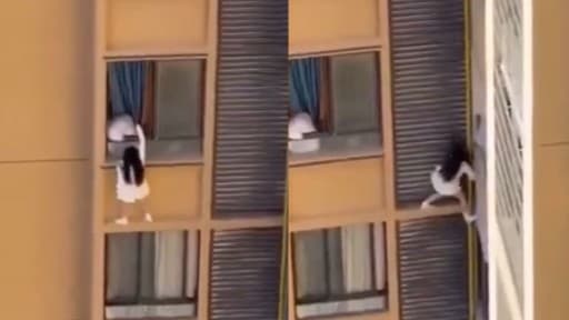 中国で女性がマンション10階の窓から逃げる