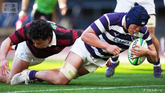 <ruby ><rb><span class="unknown" word="明治">明治</span><span class="jlpt-n5" word="大学">大学</span></rb><rt>めいじだいがく</rt></ruby><span class="" word="、">、</span><span class="" word="ラ">ラ</span><span class="" word="グ">グ</span><span class="" word="ビ">ビ</span><span class="" word="ー">ー</span><ruby ><rb><span class="jlpt-n1" word="決勝">決勝</span></rb><rt>けっしょう</rt></ruby><span class="" word="で">で</span><ruby ><rb><span class="unknown" word="早稲田">早稲田</span><span class="" word="大">大</span><span class="" word="学">学</span></rb><rt>わせだだいがく</rt></ruby><span class="" word="に">に</span><ruby ><rb><span class="" word="勝">勝</span></rb><rt>か</rt></ruby><span class="" word="つ">つ</span>